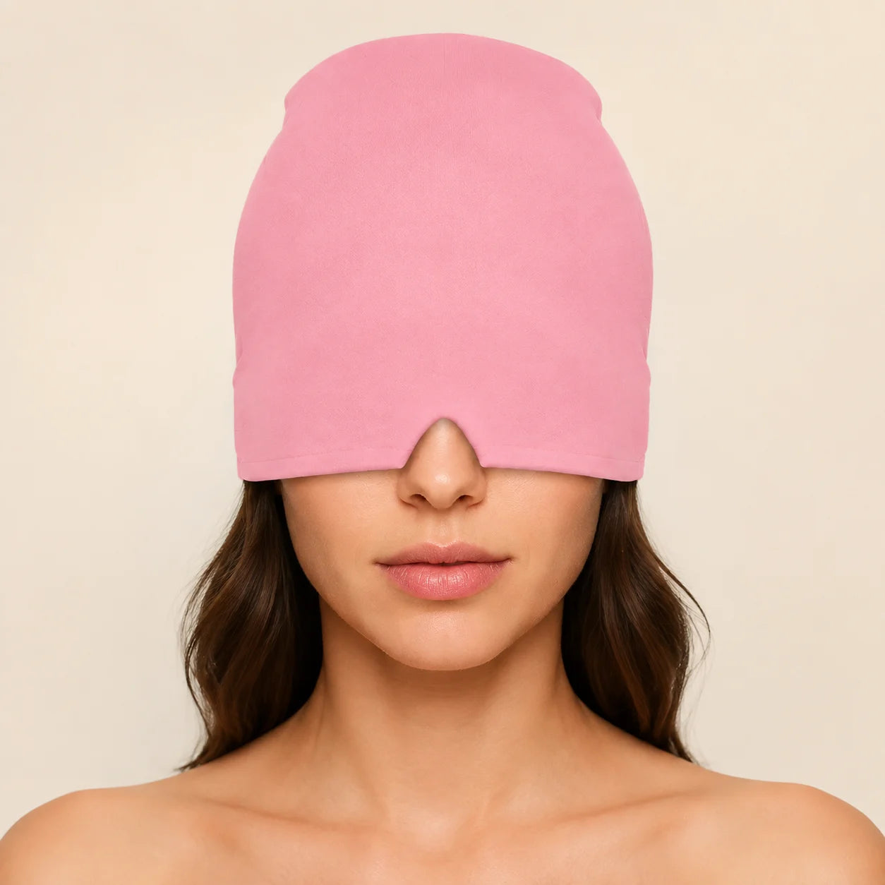 Pink NuraCool cap positioned over the eyes